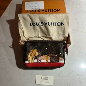 New!  Louis Vuitton Mini Pouchette from the Christmas Animation line.